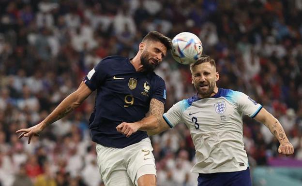 Olivier Giroud heads a balloon during the England-France quarters match. 